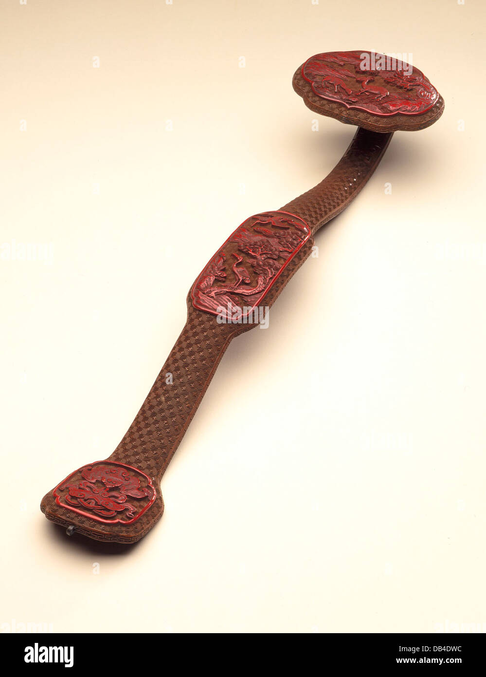 This scepter, or Ruyi, is a ceremonial object adorned with symbolic ...