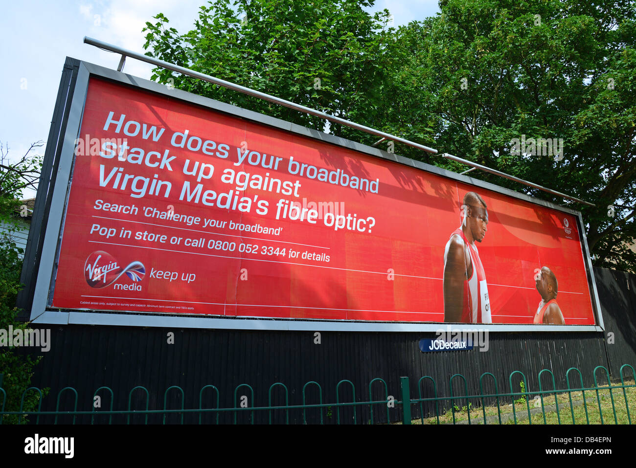 Virgin Media advertising hoarding, East Street, Epsom, Surrey, England, United Kingdom Stock Photo