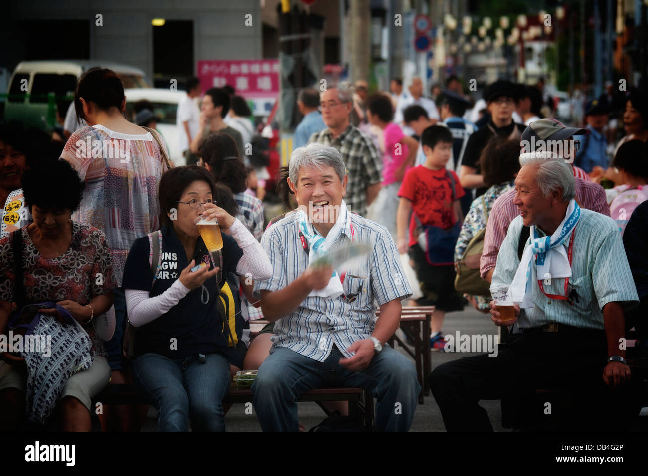 Old Japanese people waiting for the Akita Kanto Festival to start Stock Photo