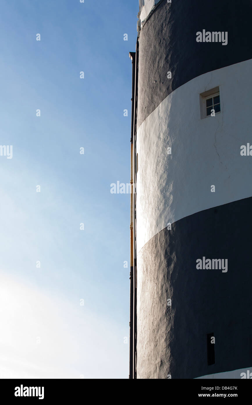 The striped facade of Hook lighthouse located at Hook head is one of the oldest lighthouses in the world in Count Wexford Stock Photo