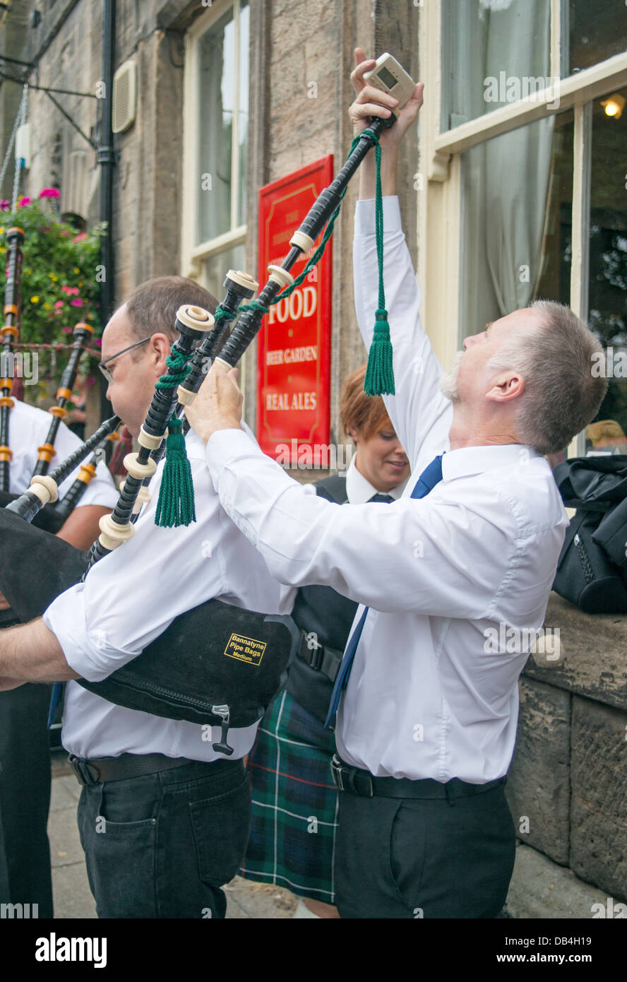 Man tuning bagpipe hires stock photography and images Alamy