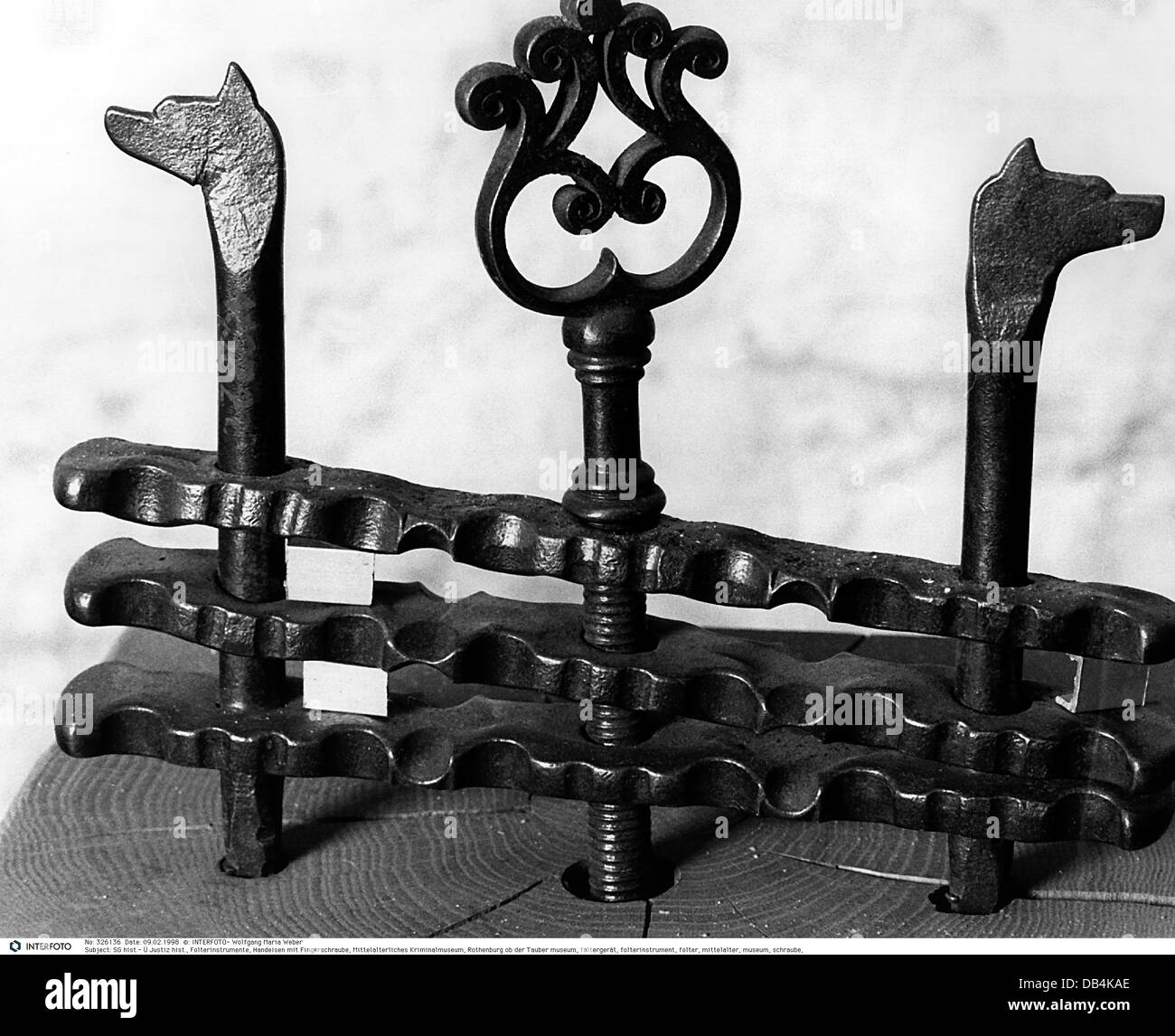 justice, instrument of torture, hand iron with thumb screw, museum of medieval crimes, Rothenburg ob der Tauber, historic, historical, thumbscrews, torture device, instruments of torture, torture devices, medieval times, Middle Ages, technics, chain, chains, Additional-Rights-Clearences-Not Available Stock Photo