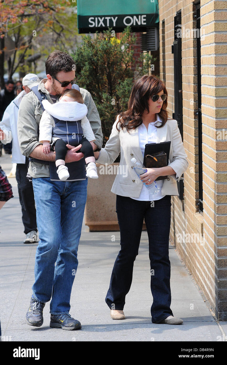 Tiffani Thiessen and husband Brady Smith with daughter Harper Renn heading  to the film location for 'White Collar' on the streets of Manhattan, New  York City, USA - 18.04.11 Stock Photo - Alamy