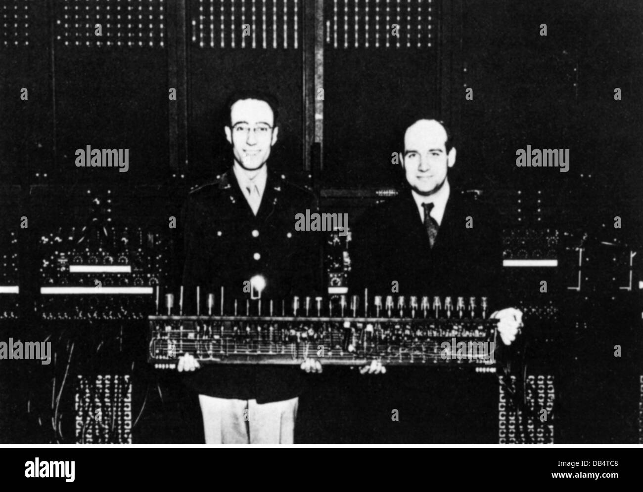 electronics, data processing, computer, ENIAC (Electronical Numerical and Computer), J.P. Eckert (right) and Captain Goldstine, developers of the ENIAC with ring counter, 1946, Additional-Rights-Clearences-Not Available Stock Photo