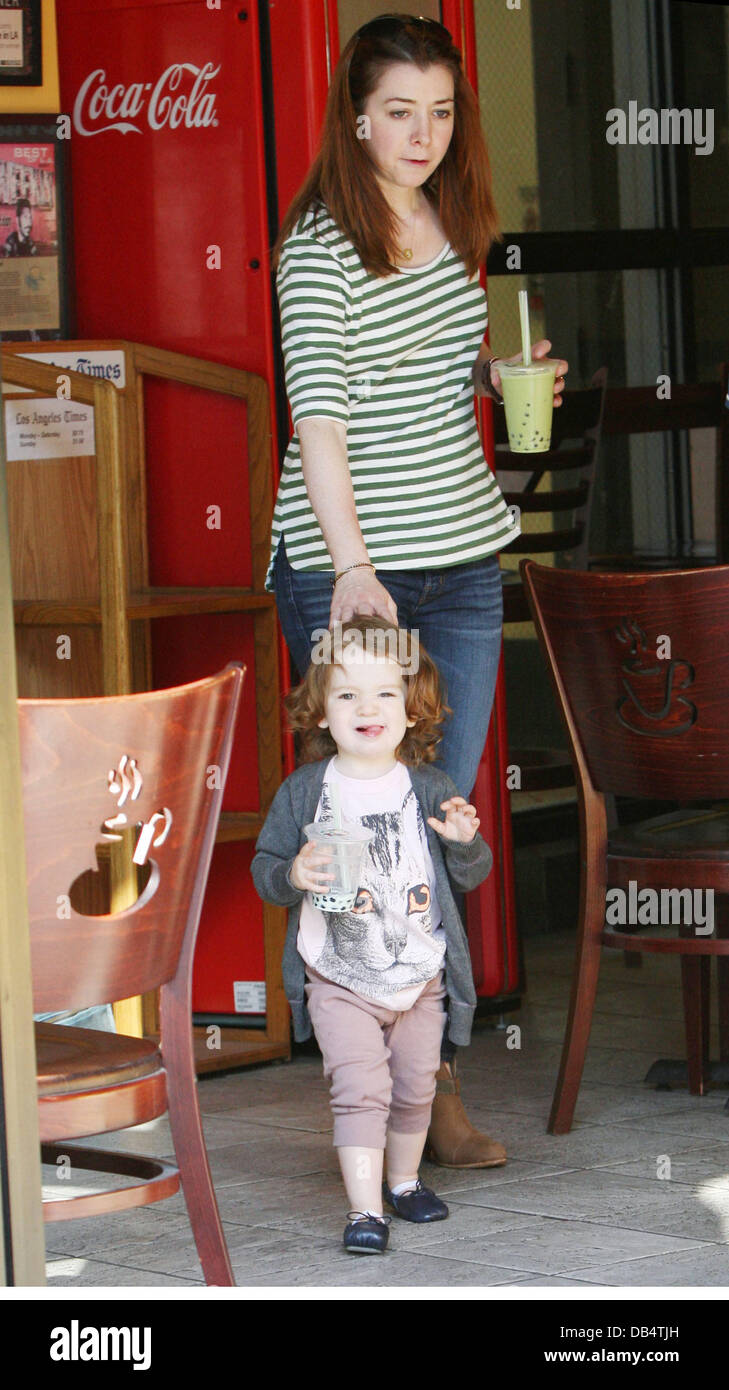 Alyson Hannigan and her daughter Satyana Marie Denisof grab a