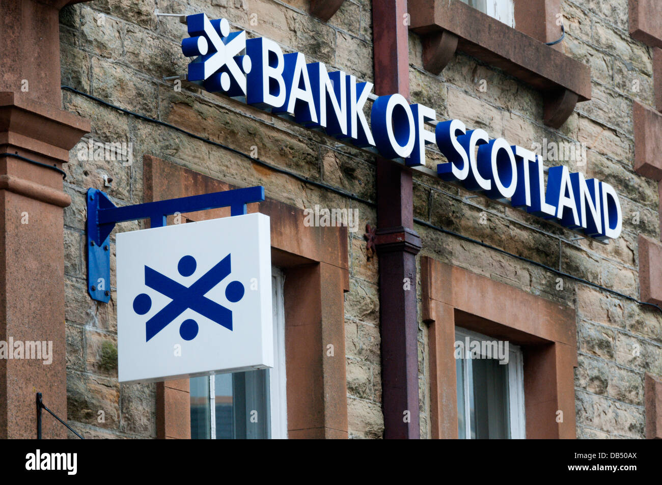 The name of the Bank of Scotland on the front of a stone building. Stock Photo
