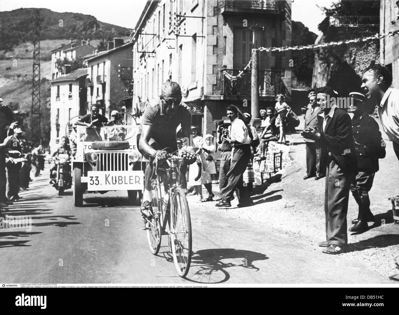 sports, cycling, Tour de France 1950, stage 20, St. Etienne - Lyon, stage winner Ferdi Kübler (Switzerland) driving through a town, 3.8.1950, 1950s, 50s, 20th century, historic, historical, cycle race, cycle races, bicycle racing sport, athlete, athletes, cyclist, cyclists, overall winner, racing cyclist, bicycle racer, people, Additional-Rights-Clearences-Not Available Stock Photo