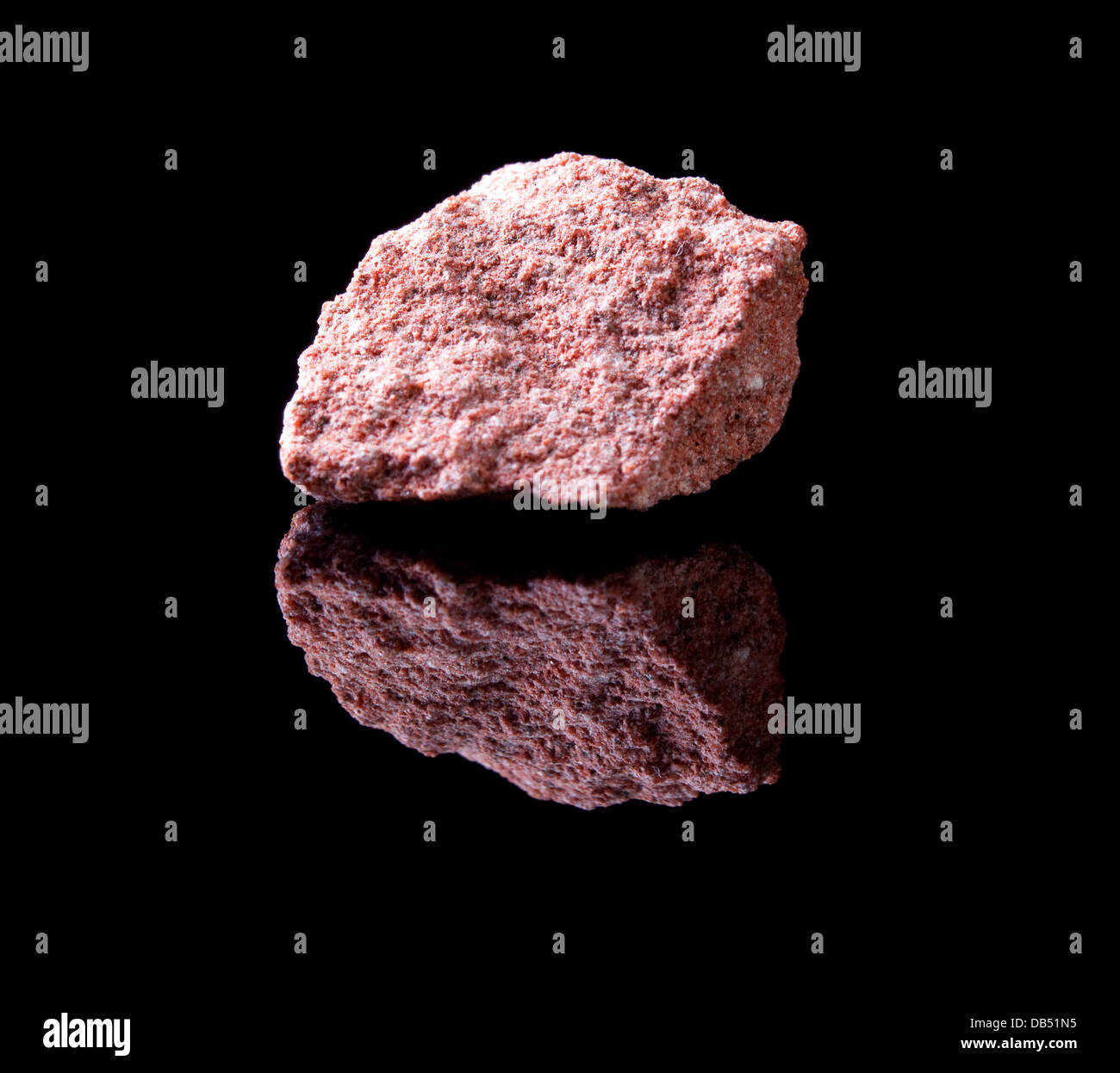 Uncut rock piece of sandstone a sedimentary rock composed of sandsized