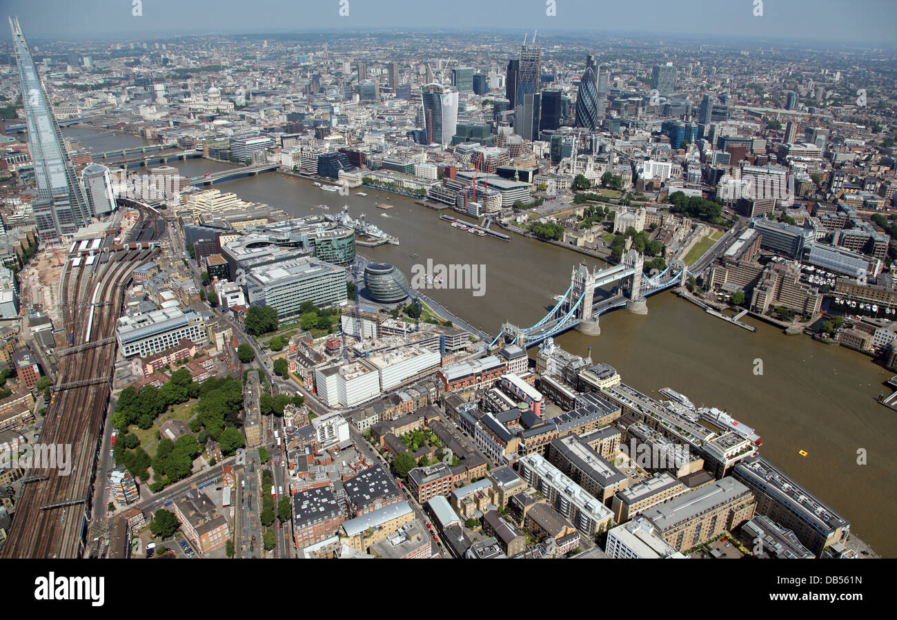 aerial view of The Thames in London with Tower Bridge, The City and City Hall Stock Photo