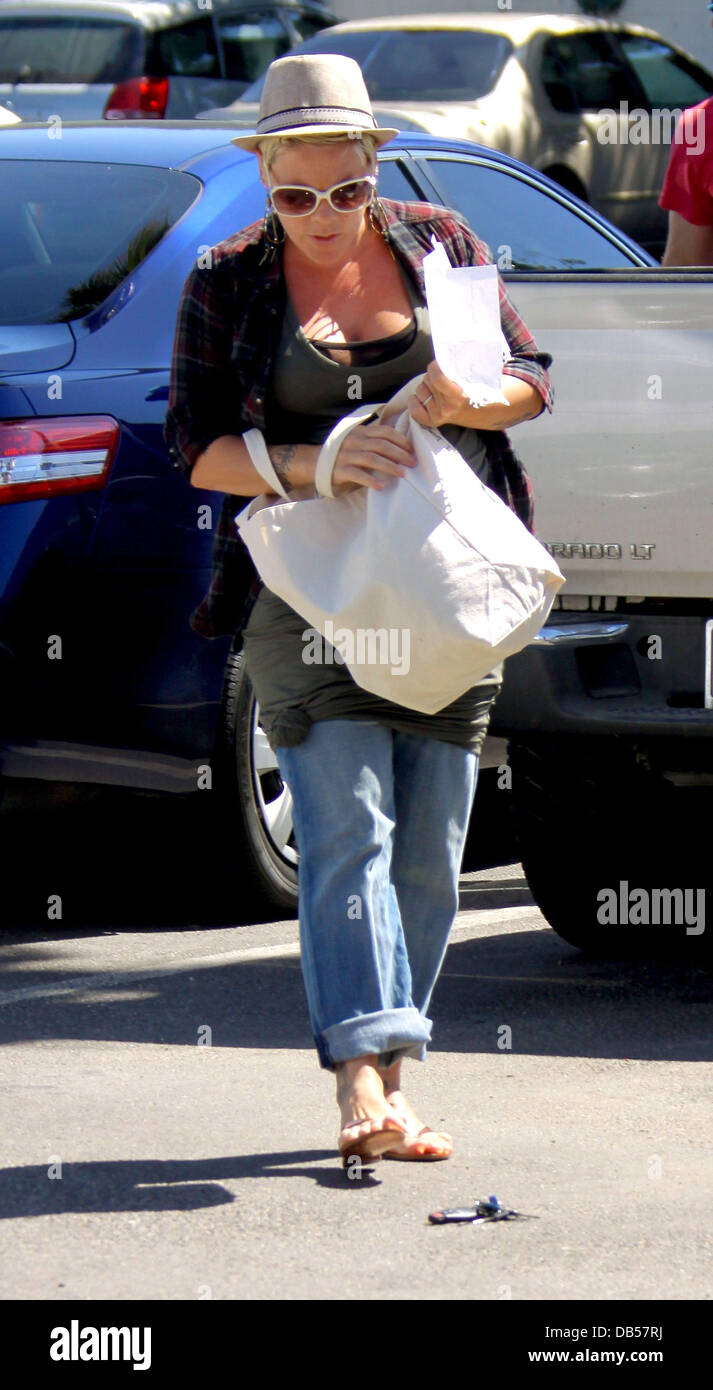 Heavily pregnant Pink aka Alecia Moore shopping in the easter sale at