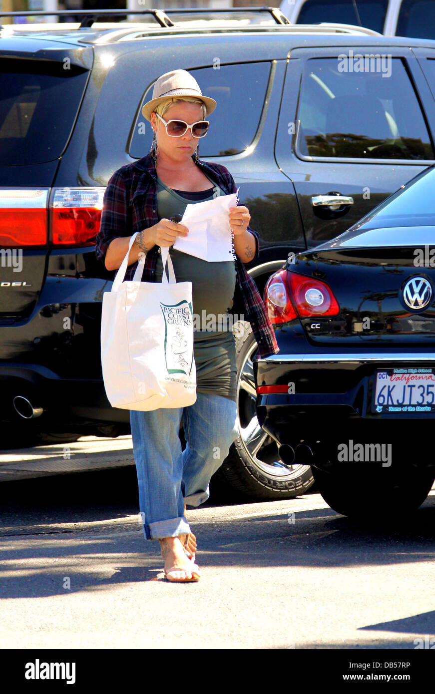 Heavily pregnant Pink aka Alecia Moore shopping in the easter sale at