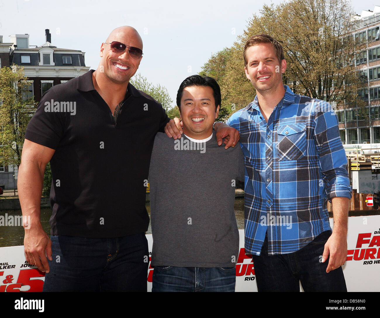 Dwayne Johnson, aka The Rock, Director, Justin Lin and Paul Walker attend a Photocall for 'Fast & Furious 5: Rio Heist' outside the Pathe Arena Amsterdam, Netherlands - 26.04.11 Stock Photo