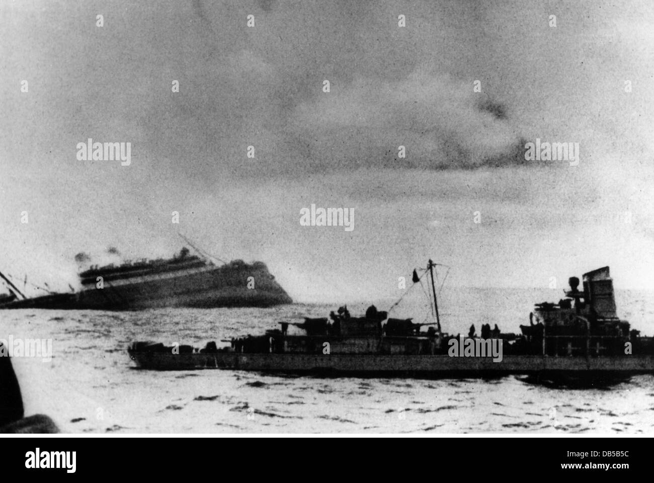 events, Second World War / WWII, Norway, sinking of the British troop transport 'Orama' by the German heavy cruiser 'Admiral Hipper', 4.6.1940, in the foreground a German destroyer, Additional-Rights-Clearences-Not Available Stock Photo