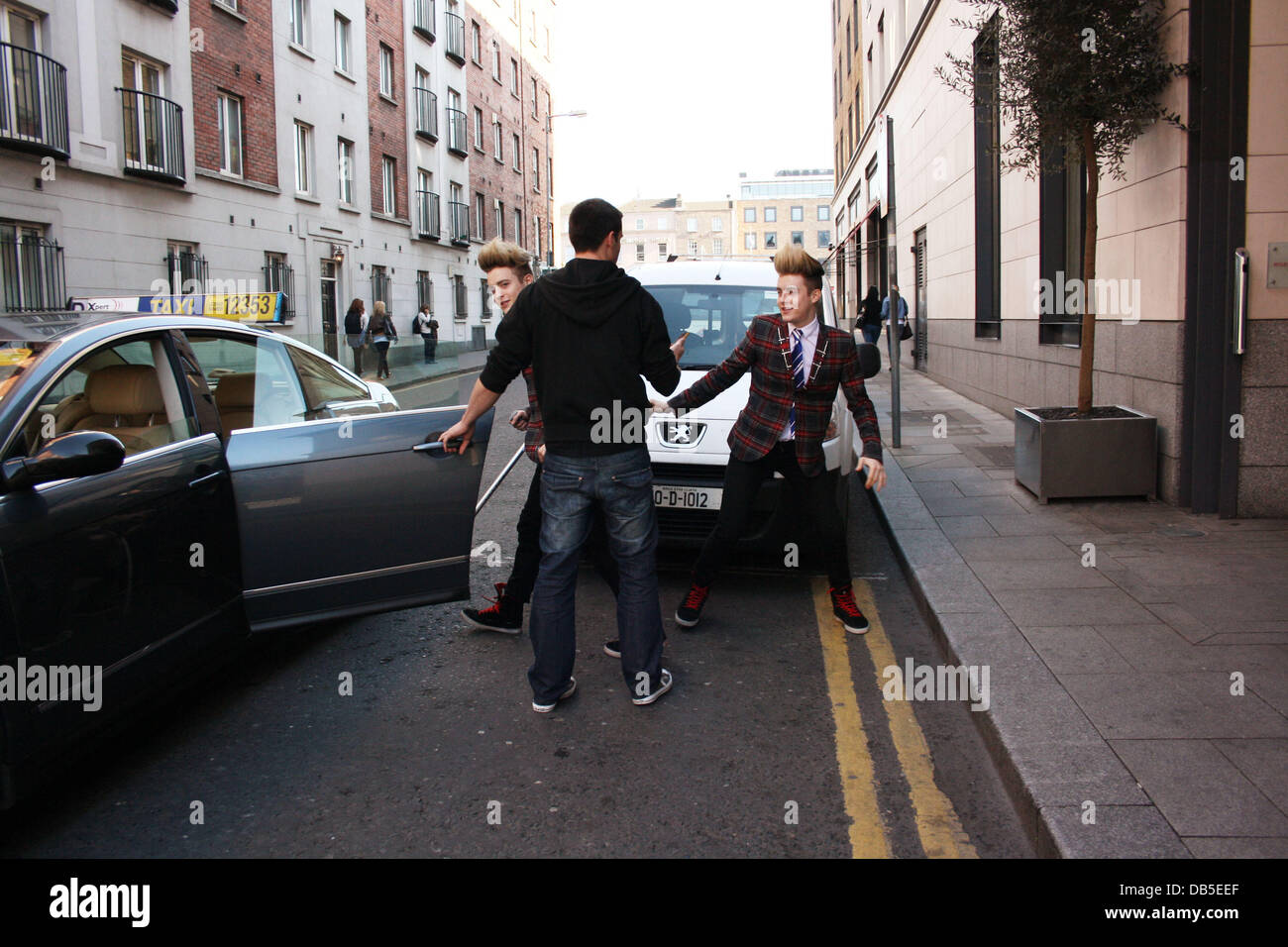 Irish Eurovision Hopefuls Jedward aka John Grimes and Edward Grimes (Edward on Crutches) leaving