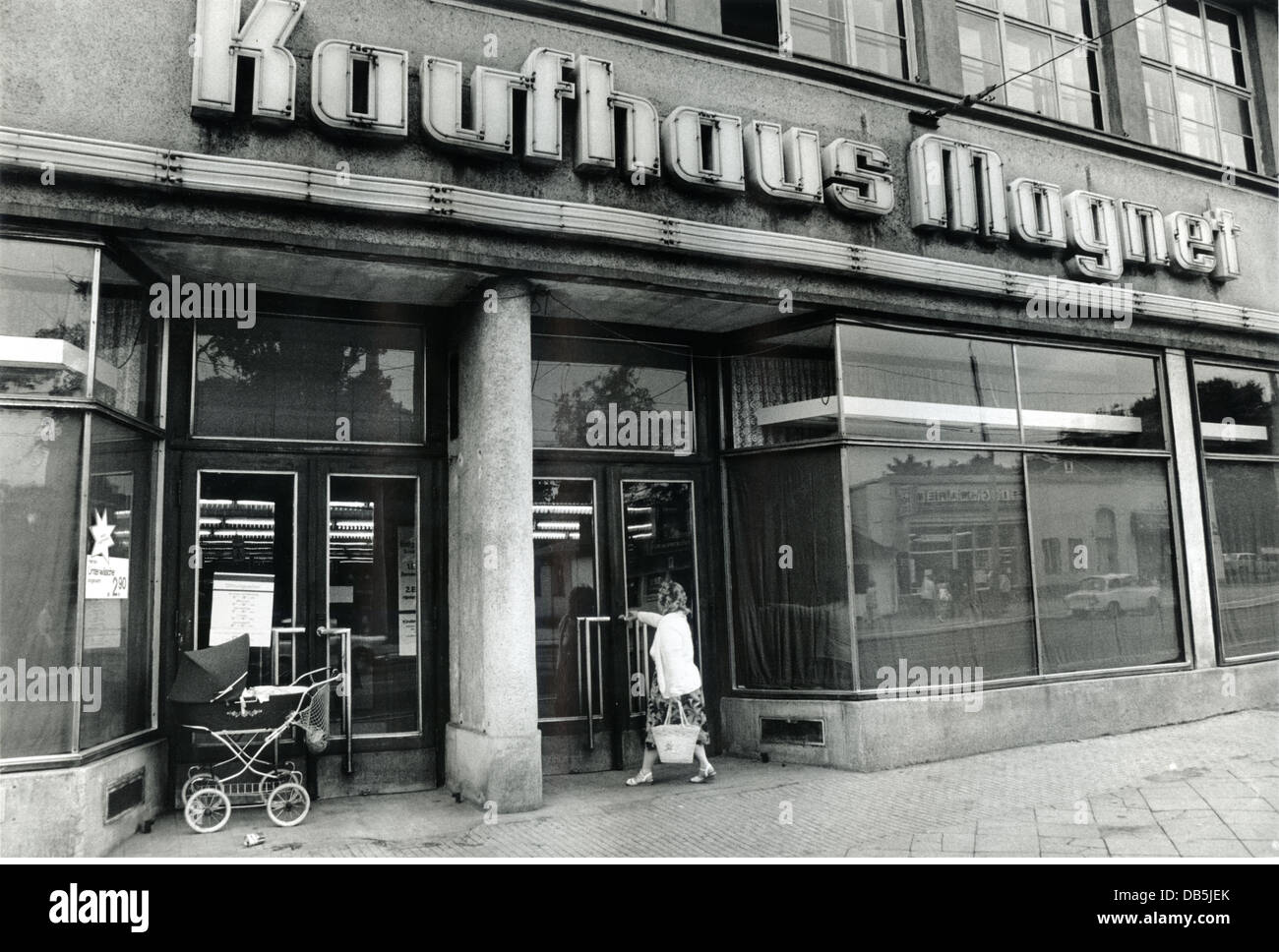 geography / travel,Germany,East-Germany,Dresden,Kaufhaus Magnet,June 1990,East German departmentstore,customer,customers,purchaser,purchasers,shop window,shop windows,empty,economy of scarcity,dreary,dismal,depressing,grey,gray,storefront,storefronts,shop front,shop fronts,shops,store,stores,entrance,entranceway,ramshackle,everyday life,daily routine,East German life,sales,sell,selling,sells,sold,on sale,purchase,buy,purchasing,buying,shop,shopping,turning points,turning point,East German economy,90s,1990s,1990,,Additional-Rights-Clearences-Not Available Stock Photo