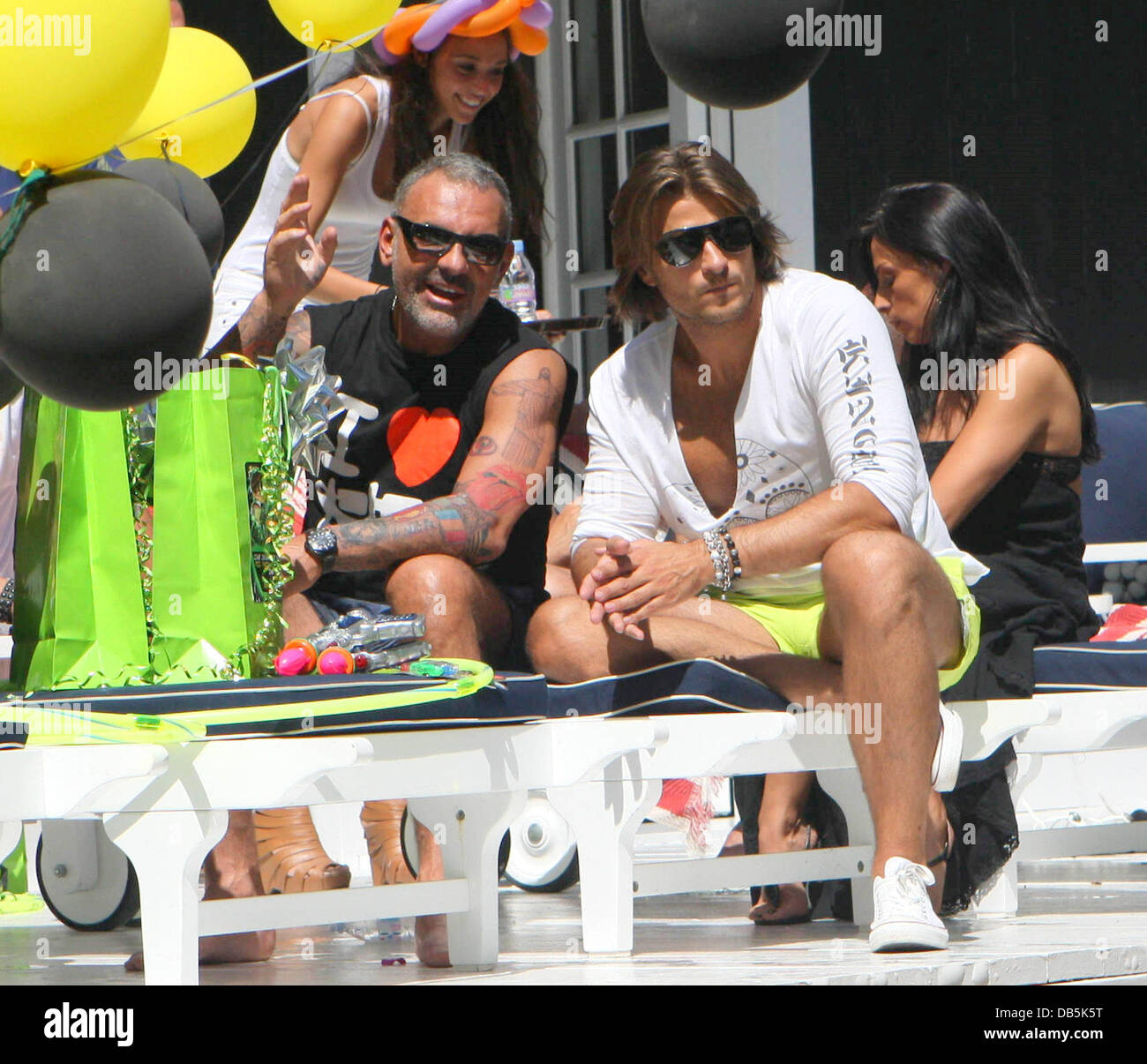 Christian Audigier and a friend Christian Audigier’s son Rocco