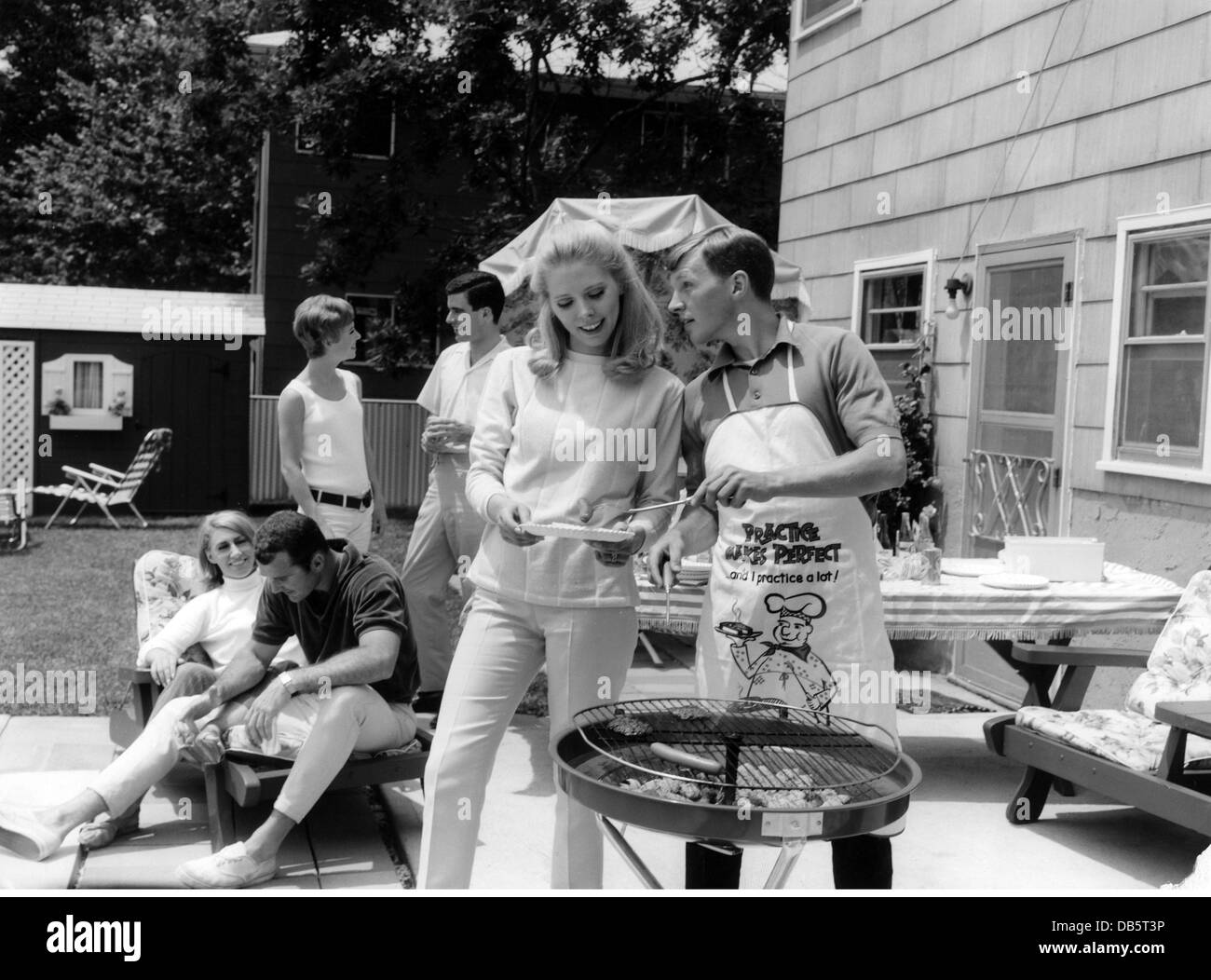 leisure, barbecue, young people having a BBQ, circa 1960 Stock Photo
