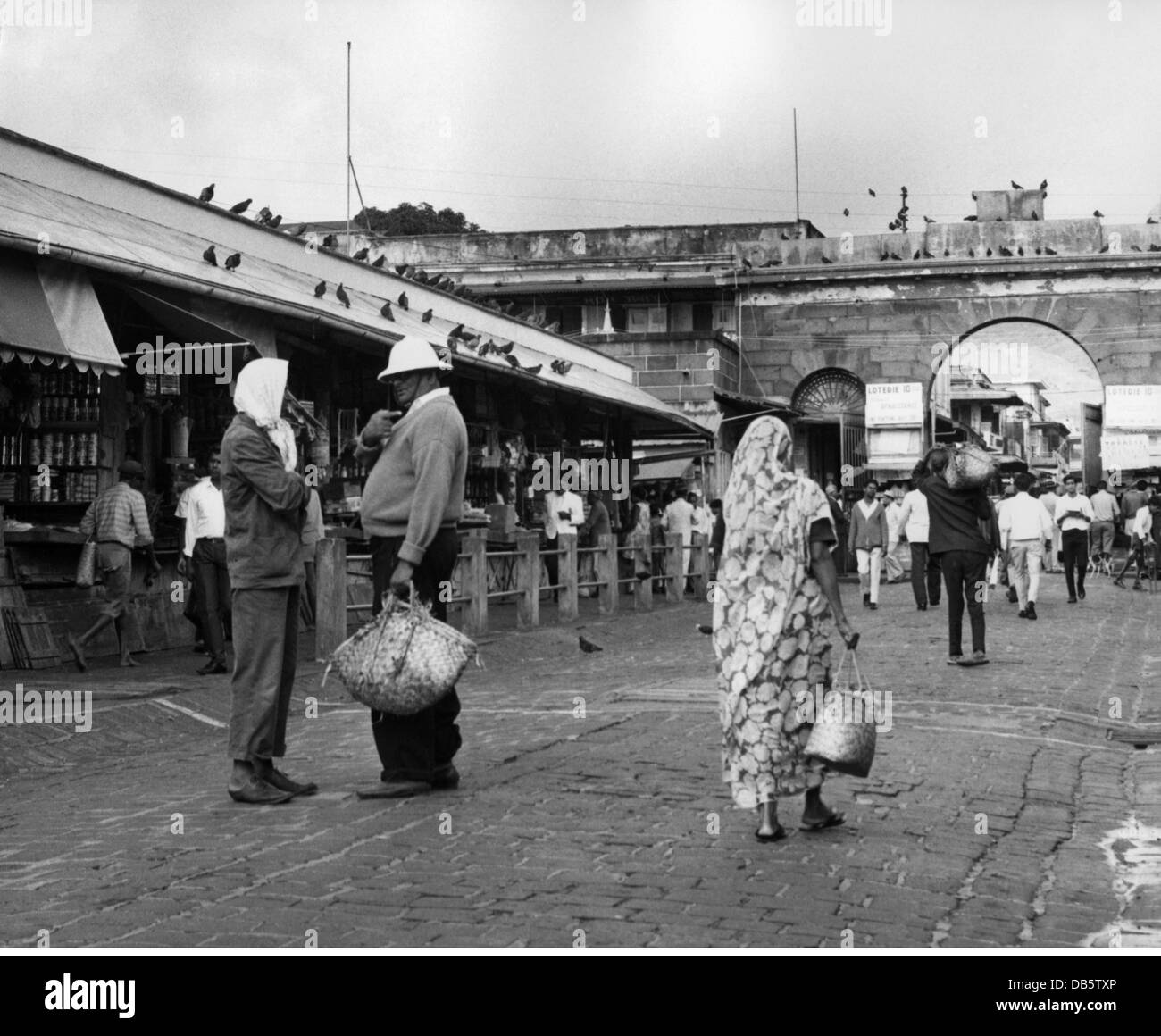 geography / travel, Mauritius, Port Louis, Central Market with Port West, 1960s, 60s, 20th century, historic, historical, store, stores, shop, shops, trade, dealer, dealers, street scene, street scenes, pedestrian, pedestrians, passer-by, passerby, passers-by, old town, historic city centre, historic city center, inner city, midtown, city centre, town centre, urban core, trade, people, Additional-Rights-Clearences-Not Available Stock Photo
