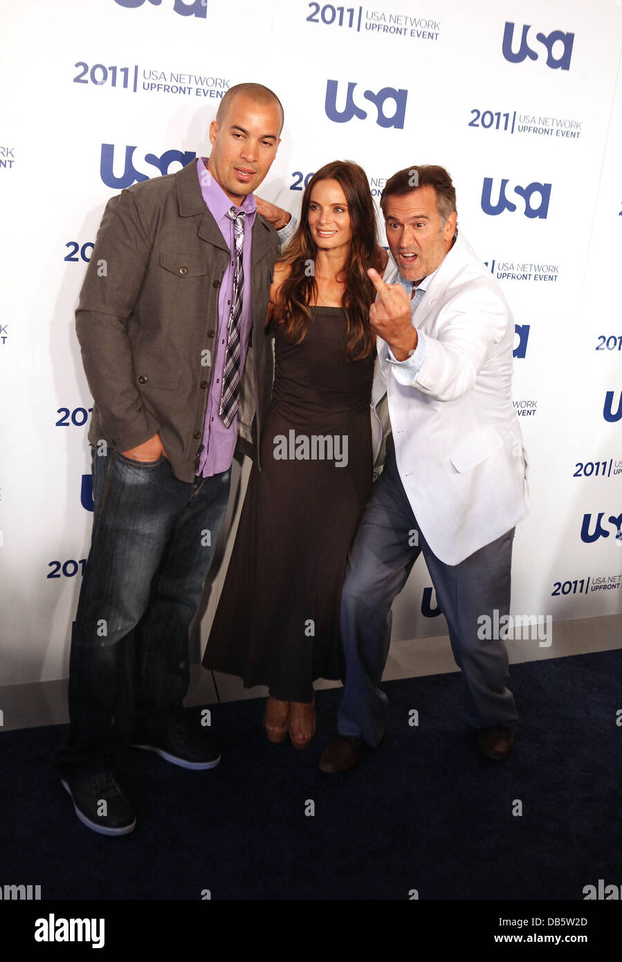Coby Bell, Gabrielle Anwar, Bruce Campbell of "Burn Notice" the 2011 USA  Upfront at The Tent at Lincoln Center New York City, USA - 02.05.11 Stock  Photo - Alamy