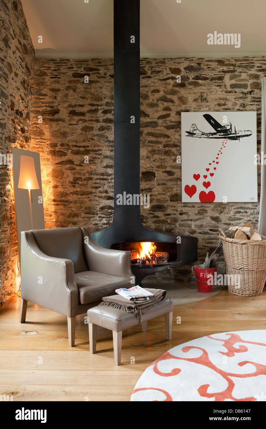 'Standard lamp' cutout from Habitat with steel fireplace by Focus, designed by Dominique Imbert Stock Photo