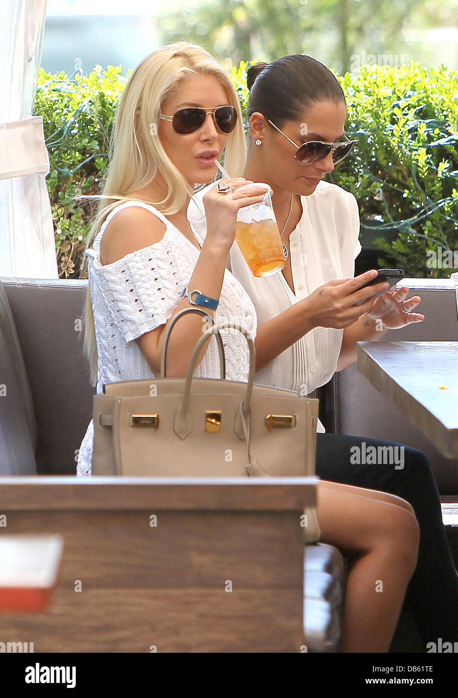 Heidi Montag and Ashley Dupre Heidi Montag drinking iced tea at Caffe Primo on Sunset Boulevard in West Hollywood. Los Angeles, California - 04.05.11 Stock Photo
