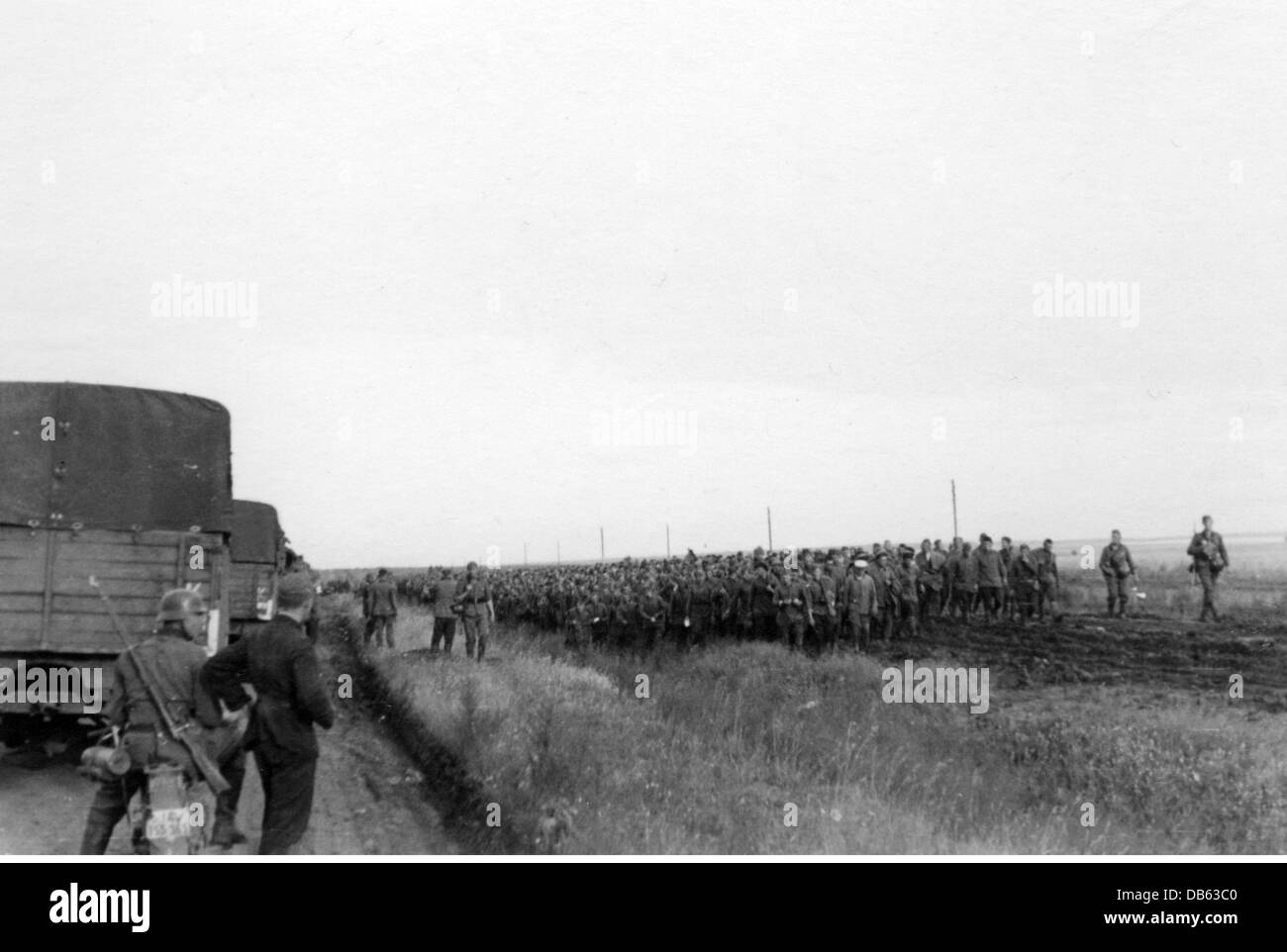 Second World War / WWII, Soviet Union, summer 1941, a convoy of a Reichsarbeitsdienst (Reich Labor Service) unit, deployed on the Eastern Front (Abteilung K. 1/130) and advancing with Panzer Group Kleist, coming across a column of Soviet prisoners of war, Ukraine, 1941, Additional-Rights-Clearences-Not Available Stock Photo