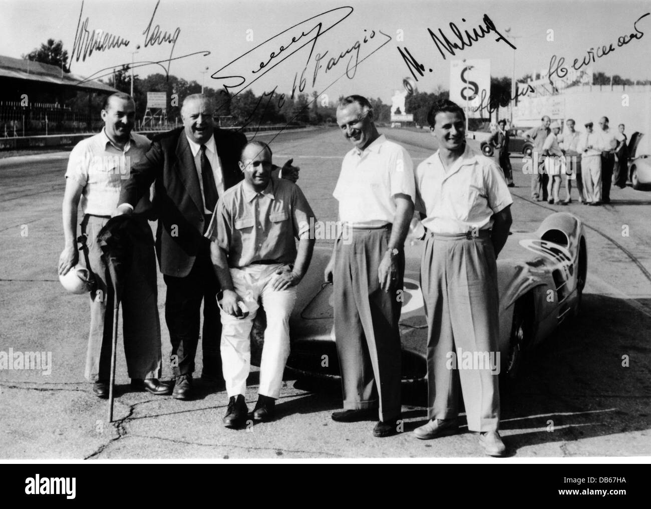 sport, car racing, Grand Prix of Italy 1954, the winning team of Mercedes-Benz: Hermann Lang, race director Alfred Neubauer, Juan Manuel Fangio, Karl Kling, Hans Herrmann, Monza, 5.9.1954, signatures, signature, autograph, autographs, Mercedes Benz, racing car, 20th century, historic, historical, people, 1950s, Additional-Rights-Clearences-Not Available Stock Photo