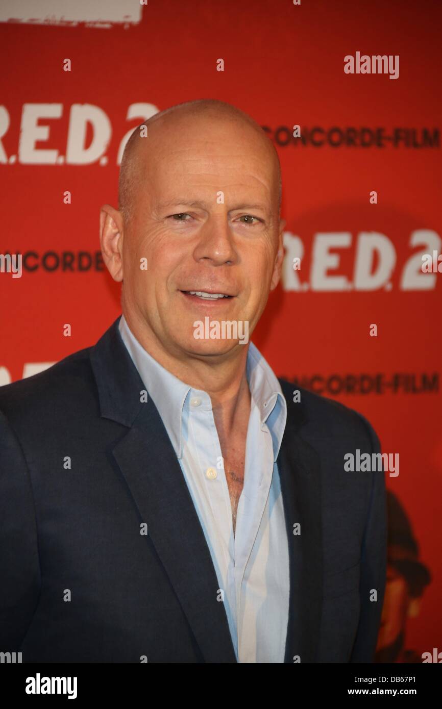 U.S. Actor Bruce Willis attends the photo call of 'R.E.D. 2' at Hotel Mandarin Oriental in Munich, Germany, on 24 July, 2013. Photo: Hubert Boesl Stock Photo