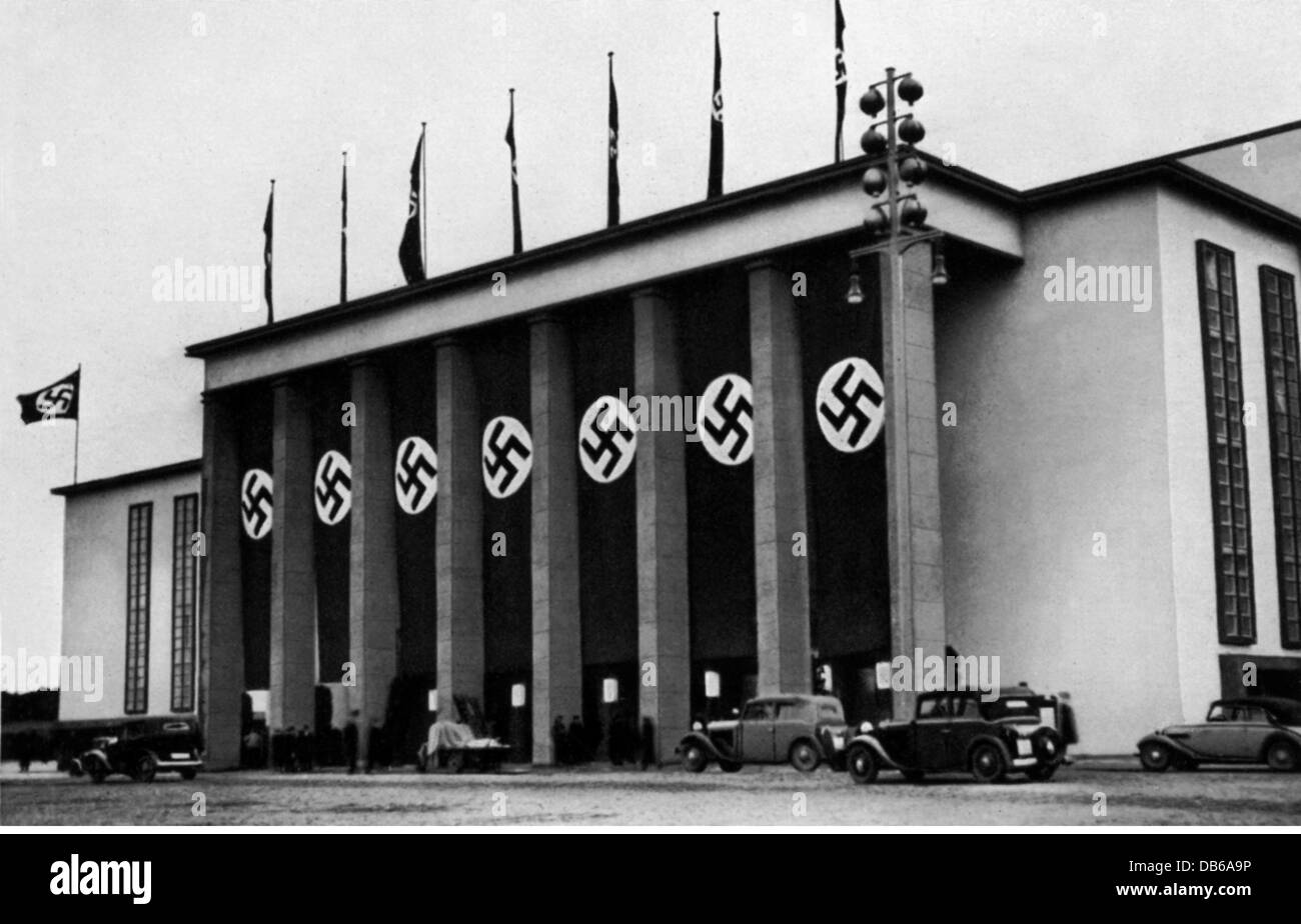 geography / travel, Germany, Berlin, Deutschlandhalle, built 1935, architect: Franz Ohrtmann, exterior view, 1936, Westend, swastikas, swastika flags, flag, German Reich, Third Reich, NS, Olympic Games 1936, architecture, Blubo (Blood and Soil), 1930s, 20th century, historic, historical, people, Additional-Rights-Clearences-Not Available Stock Photo