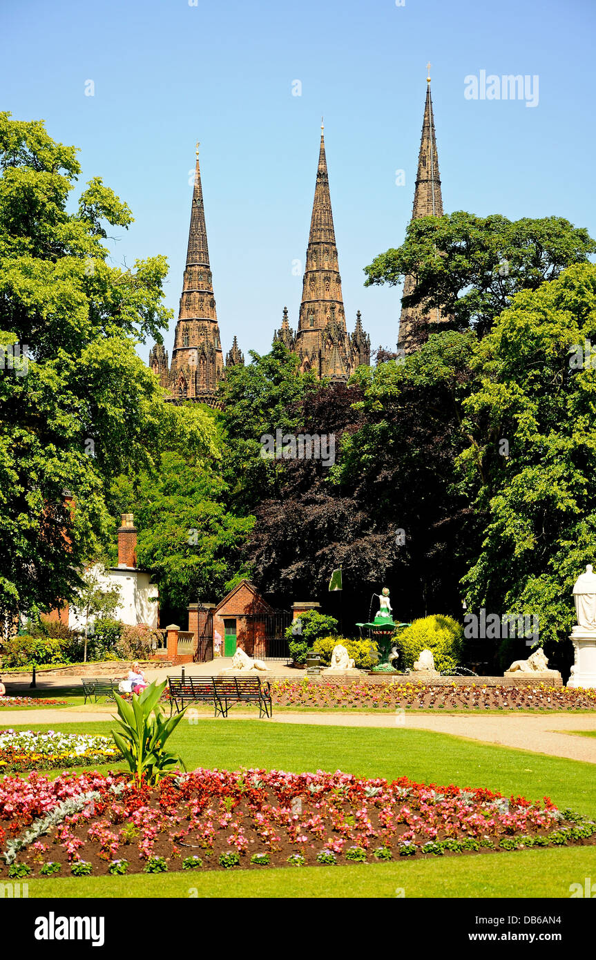 Flowerbeds in Beacon Park with the Cathedral Spires to the rear, Lichfield, Staffordshire, England, Western Europe. Stock Photo