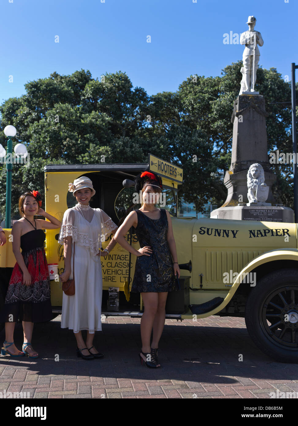 dh Art Deco weekend NAPIER NEW ZEALAND Asian girls dressed for Hooters classic vehicle 1930s fashion festival Stock Photo