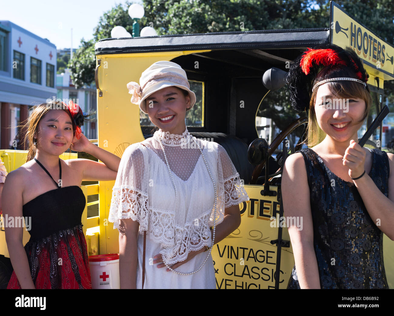 dh Art Deco weekend NAPIER FESTIVAL NEW ZEALAND NZ Asian girls dressed 1930s fashion clothes holiday festivals women tourists Stock Photo