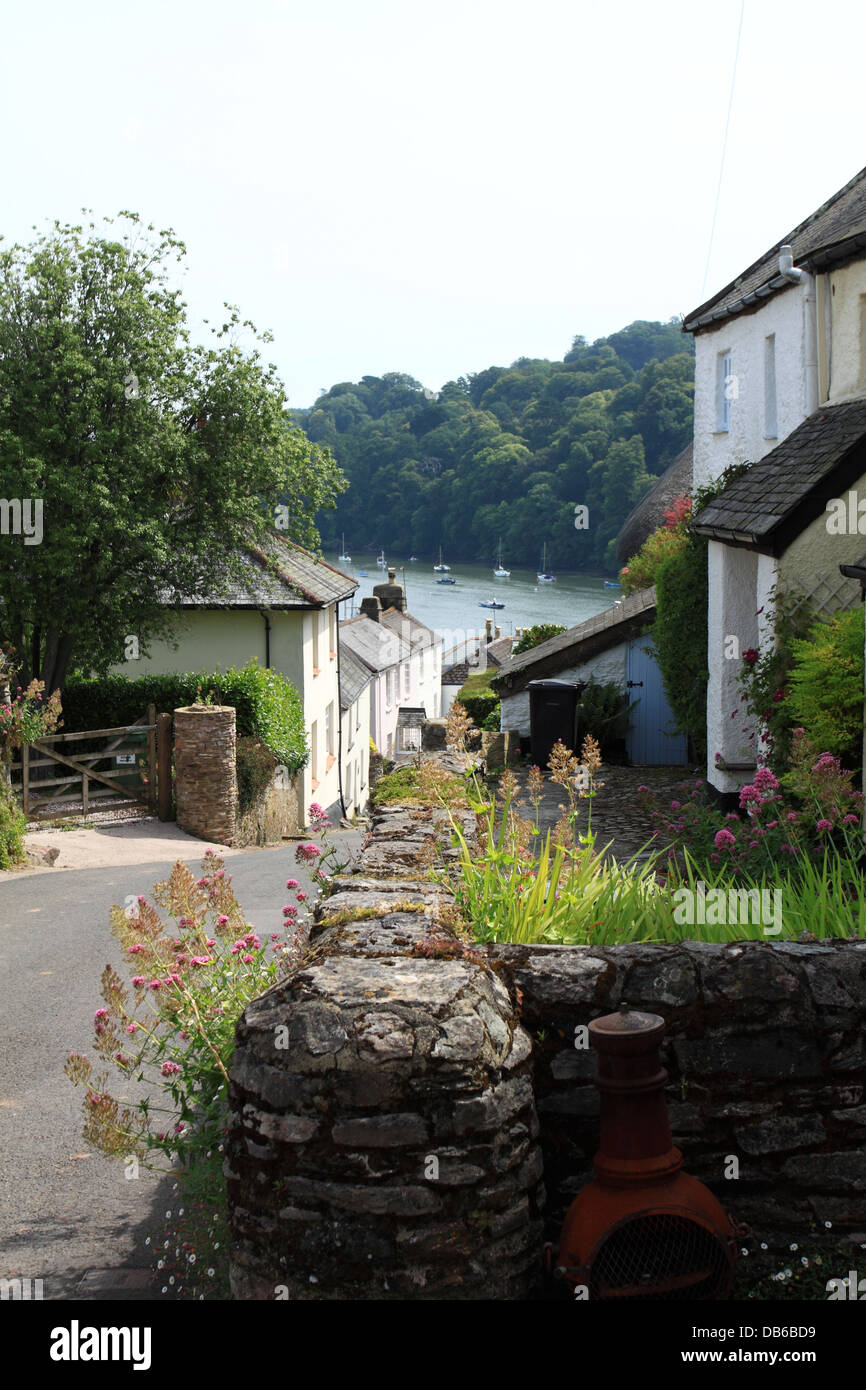 Narrow village lane down to the River Dart at Dittisham, Devon, England
