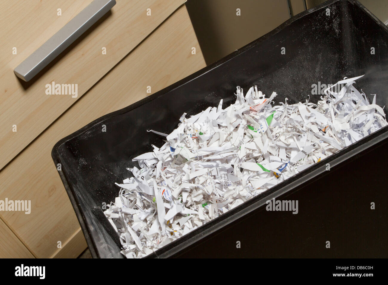 Box of shredded paper documents, destroyed to protect from identity