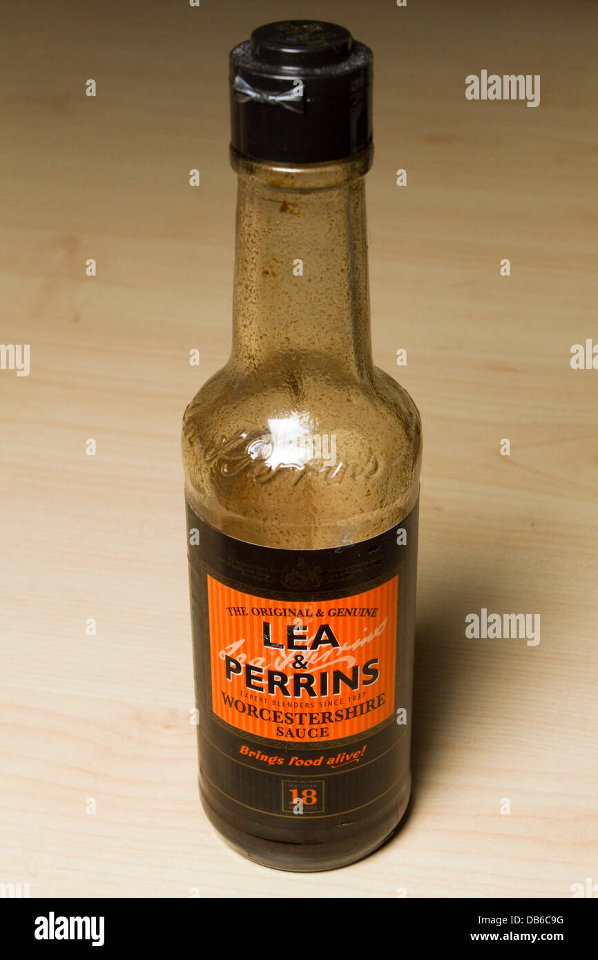 Bottle of Lea & Perrins Worcestershire sauce on a table, England, UK
