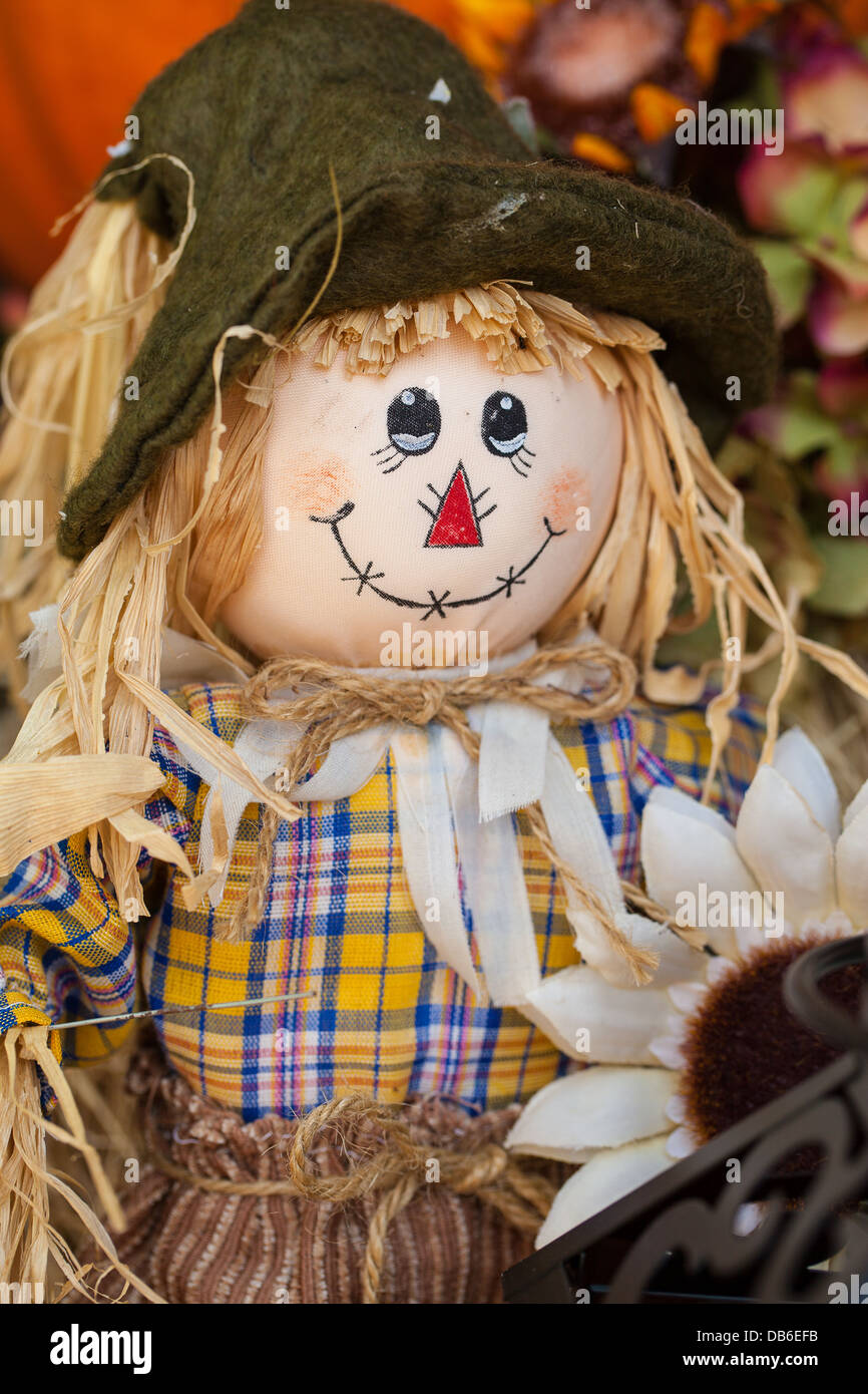 A smiling female scarecrow for autumn or fall display Stock Photo