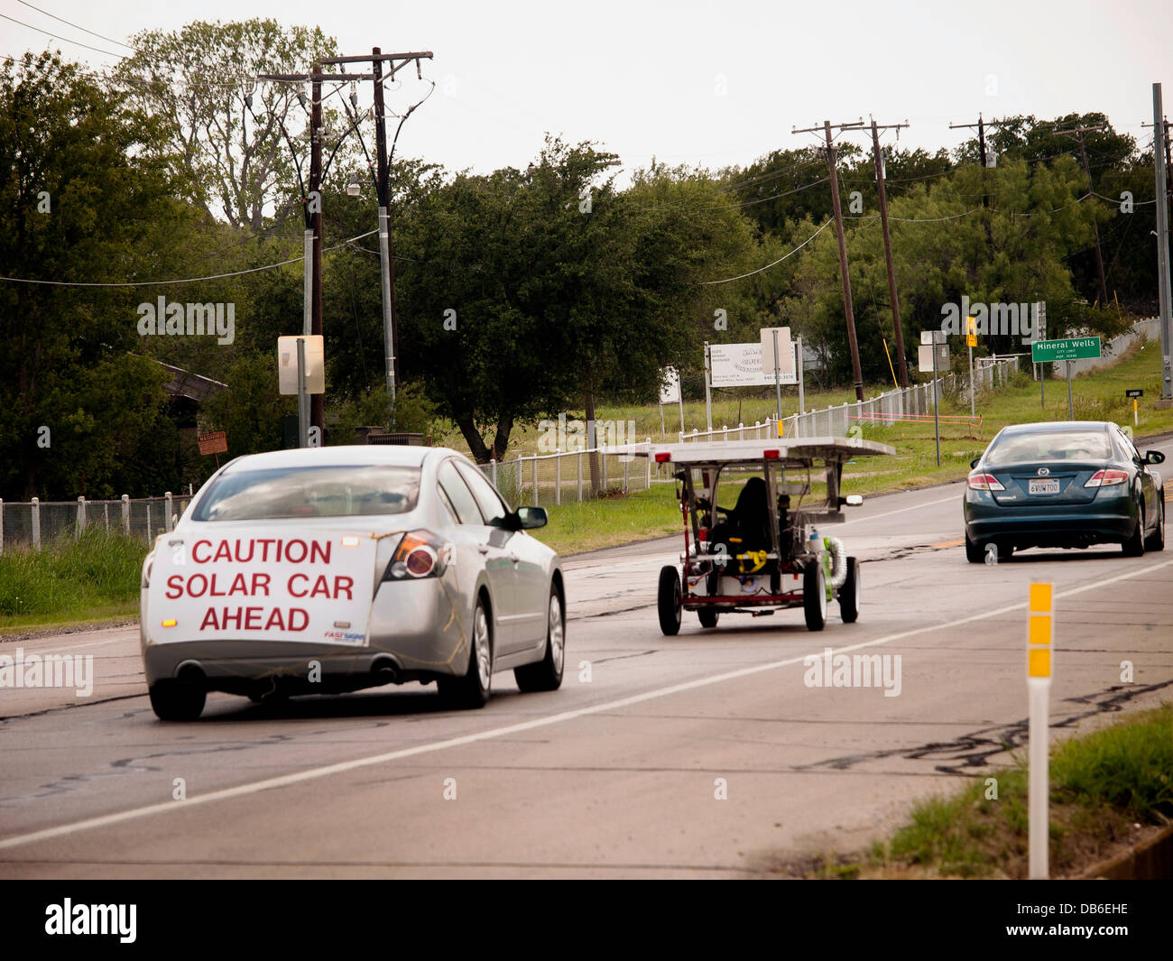 Not a fast race. High school students driving solar powered cars they built, following the sun with hopes to get from Texas to California in 8 days. The Solar Car Challenge started 20 years ago to motivate students in the sciences, engineering, and technology Stock Photo