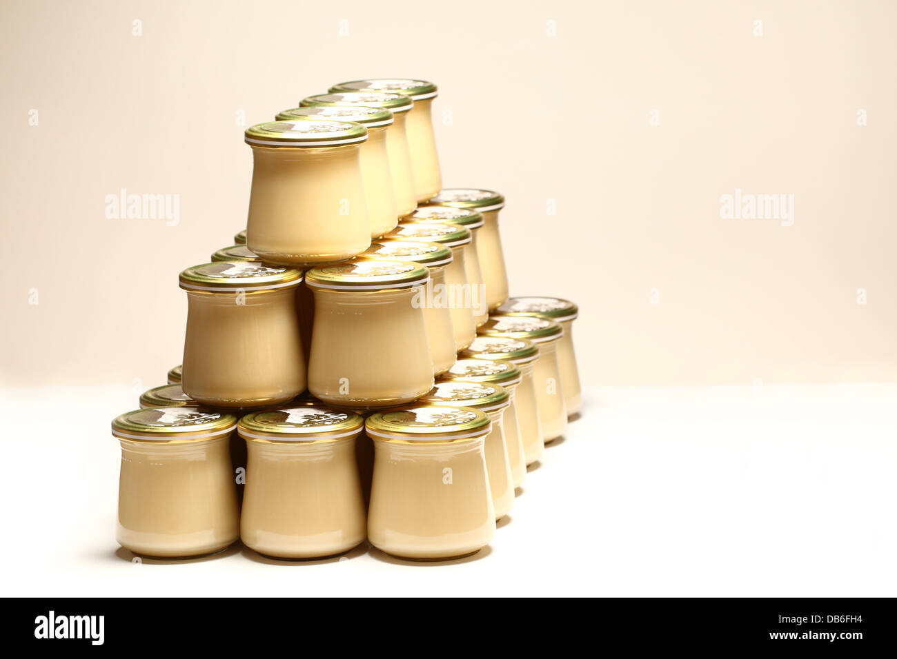 Studio shot of jars of set multifloral honey. Stock Photo