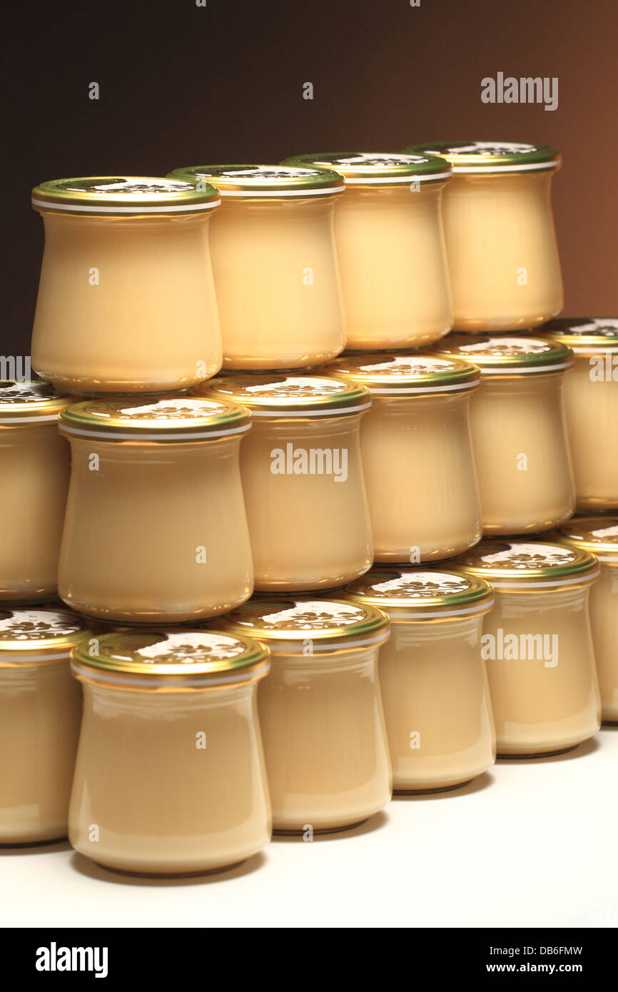 Studio shot of jars of set multifloral honey. Stock Photo