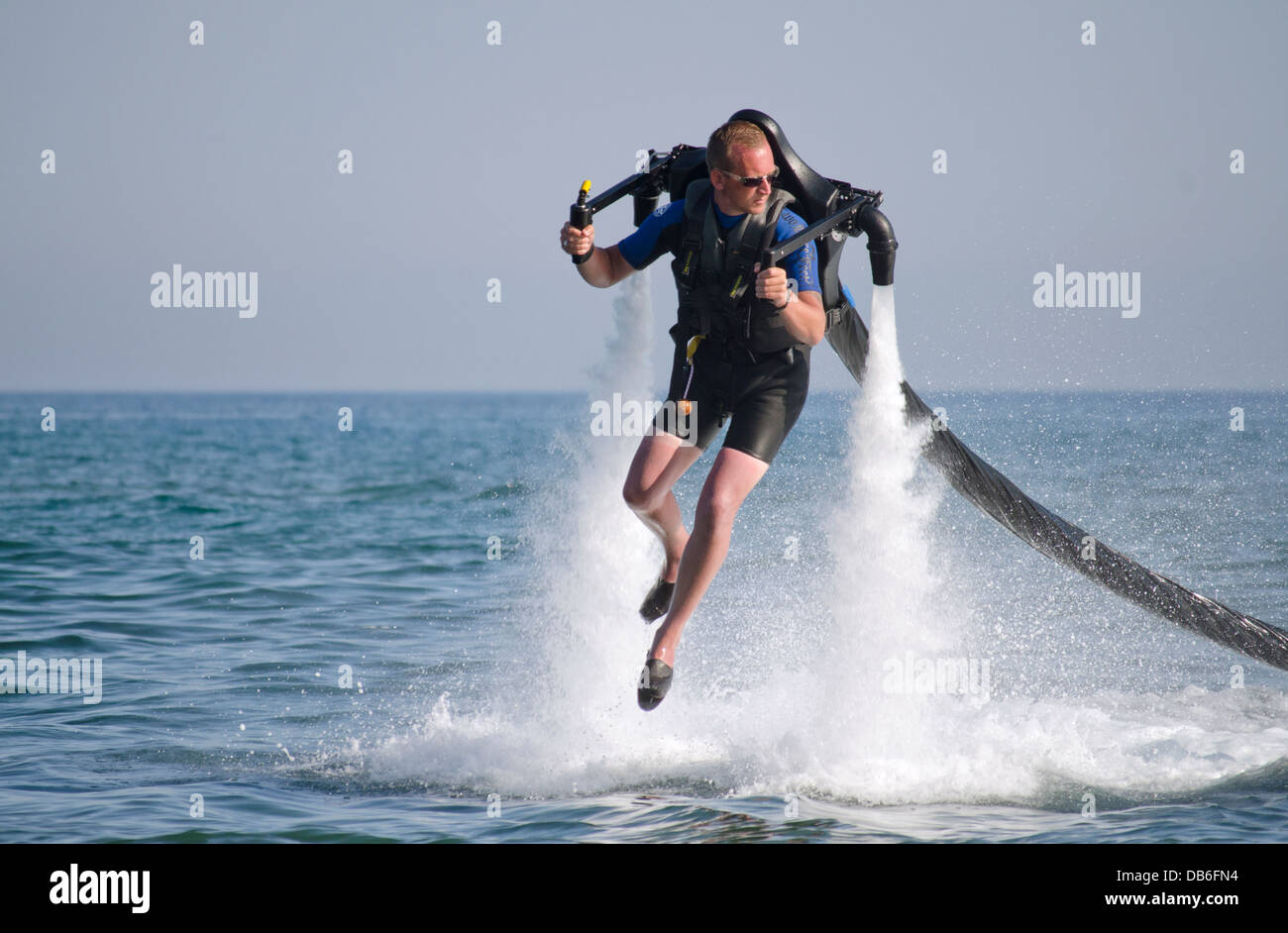 Jetlev, a personal flying machine. Flying, based on a water-propelled jetpack, near Marbella, Costa del Sol, Spain. Stock Photo