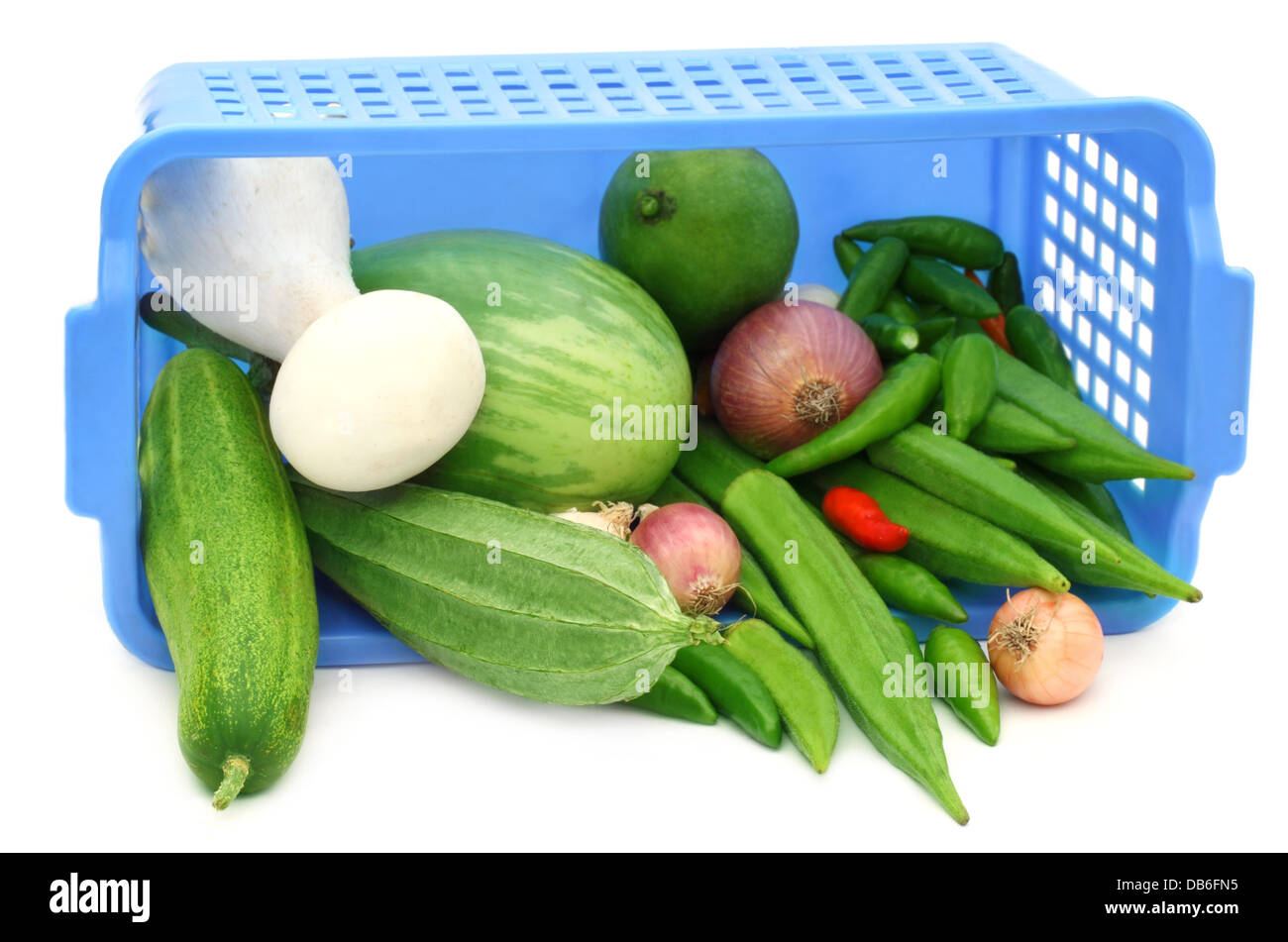 Fresh vegetables from a plastic basket Stock Photo