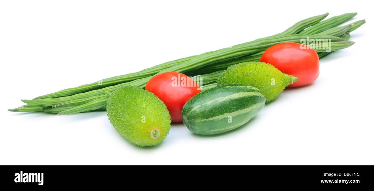 Fresh vegetables – pointed gourd, tomato and moringa oleifera Stock Photo