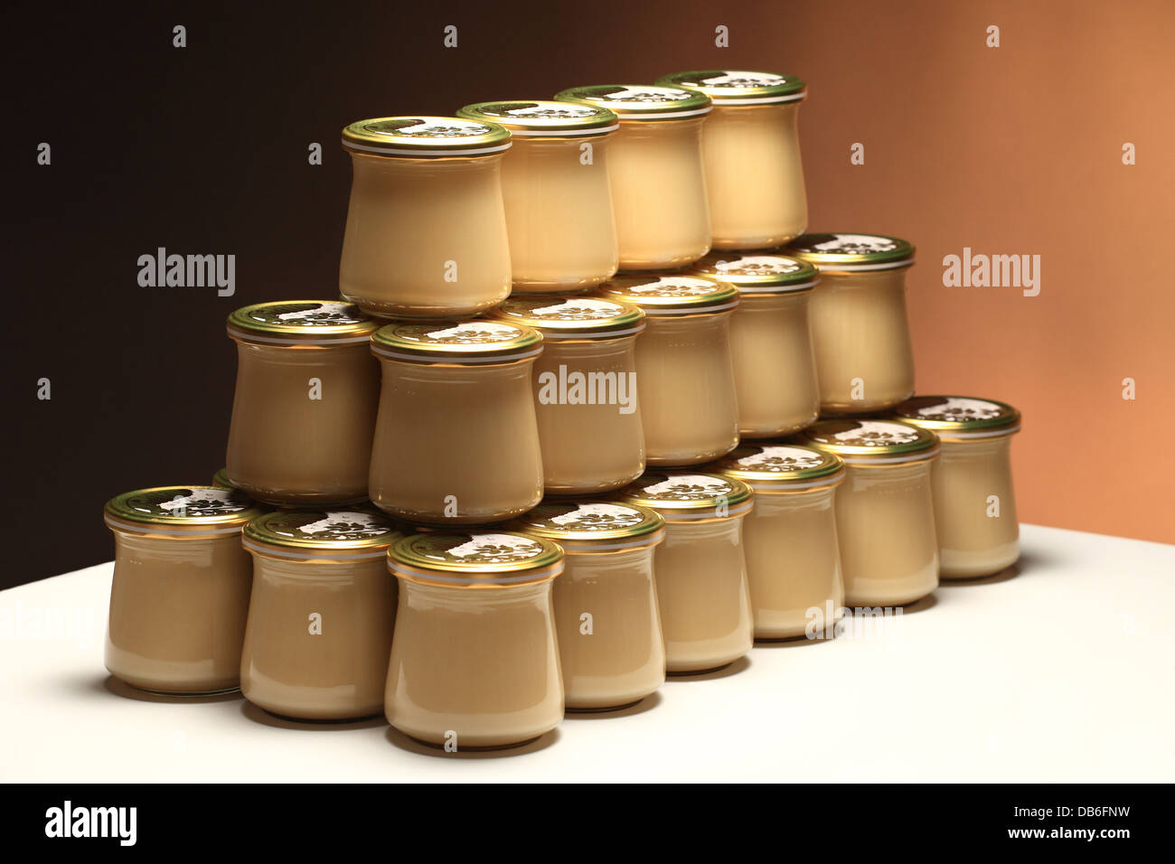 Studio shot of jars of set multifloral honey. Stock Photo