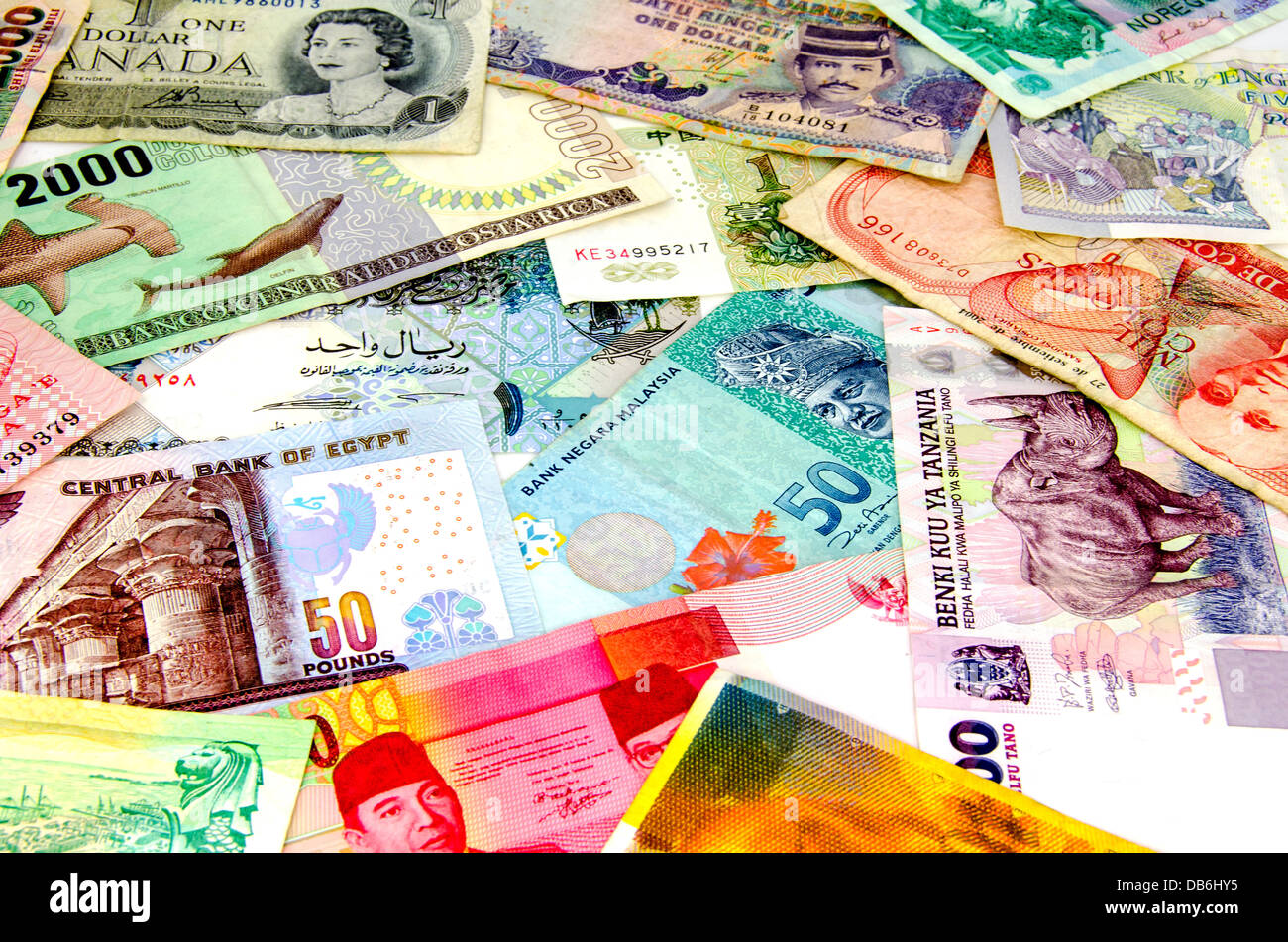 a collection of banknotes from different countries Stock Photo