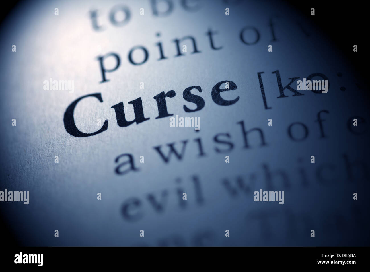 Fake Dictionary, Dictionary definition of the word Curse Stock Photo - Alamy