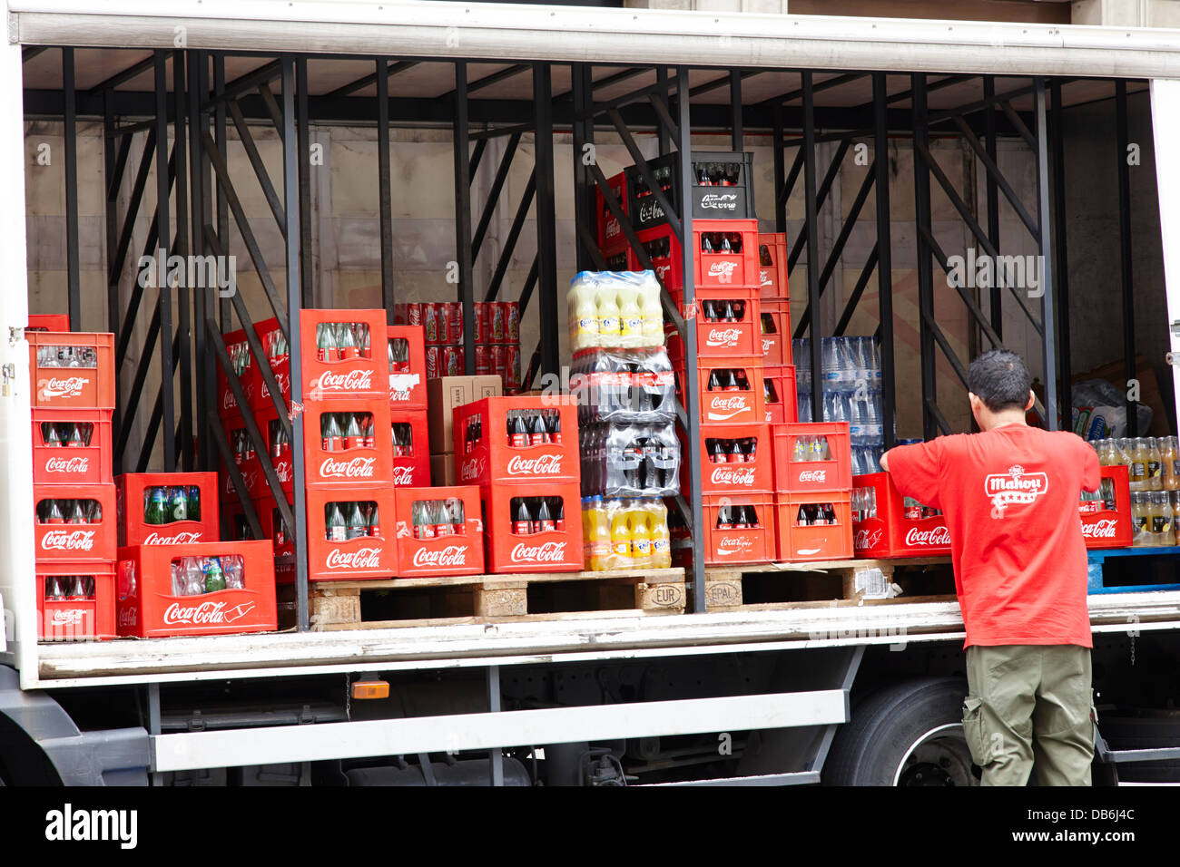 curtain sided lorry delivering soft drinks coca cola in Barcelona Catalonia Spain Stock Photo