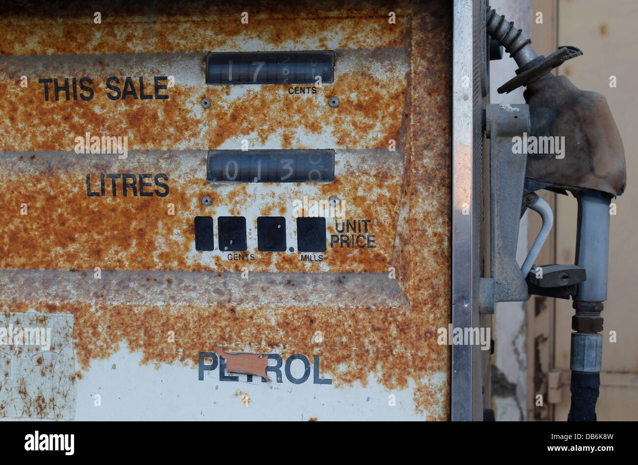 An old rusted gasoline pump with per litre price in the island of Gozo. Malta Stock Photo