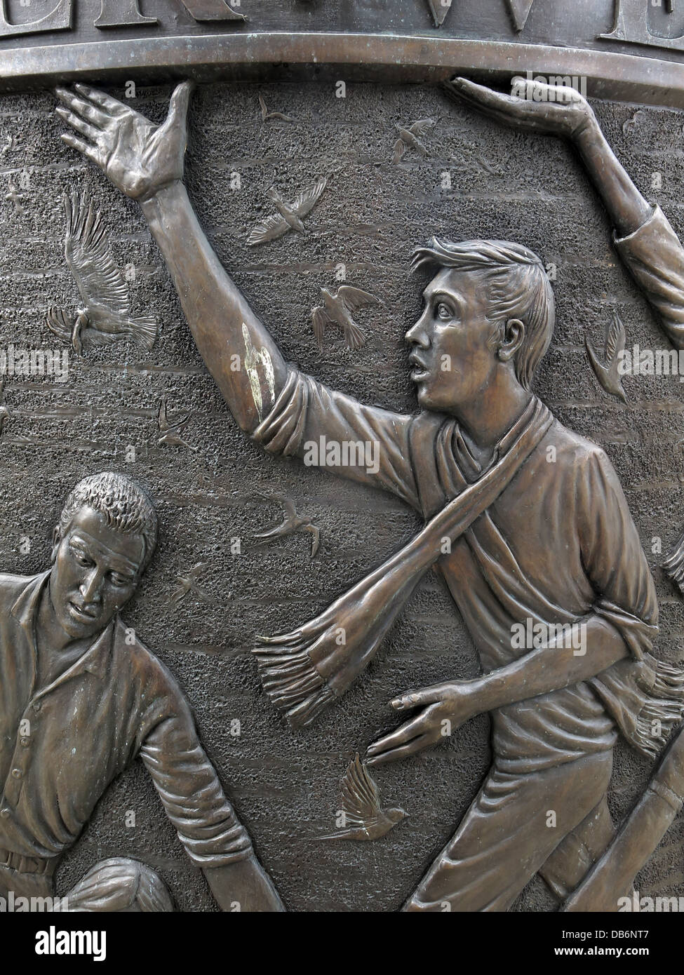 Detail from the 7 foot high circular bronze memorial in the Old Haymarket district of Liverpool Stock Photo
