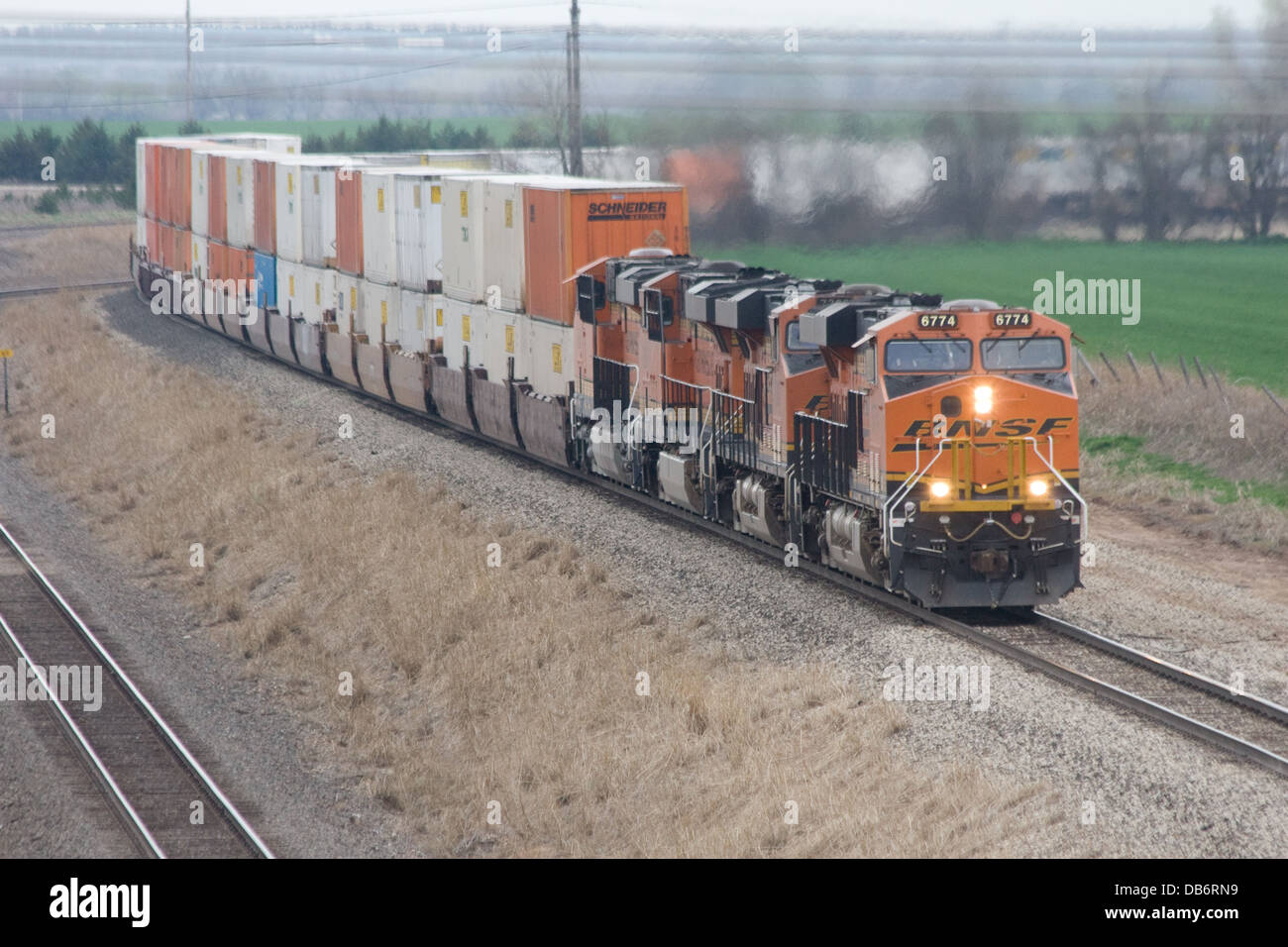 BNSF double stack container intermodal freight train at Wellington KS USA Stock Photo