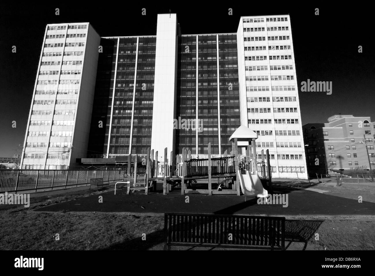 Dramatic black and white photograph of the last standing high rise at Cabrini Green in Chicago, Illinois. Stock Photo